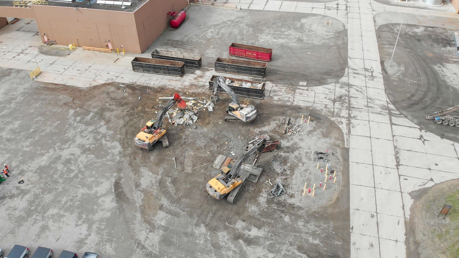 Aerial view of excavators removing rooftop structures at the Detroit-Hamtramck paint shop